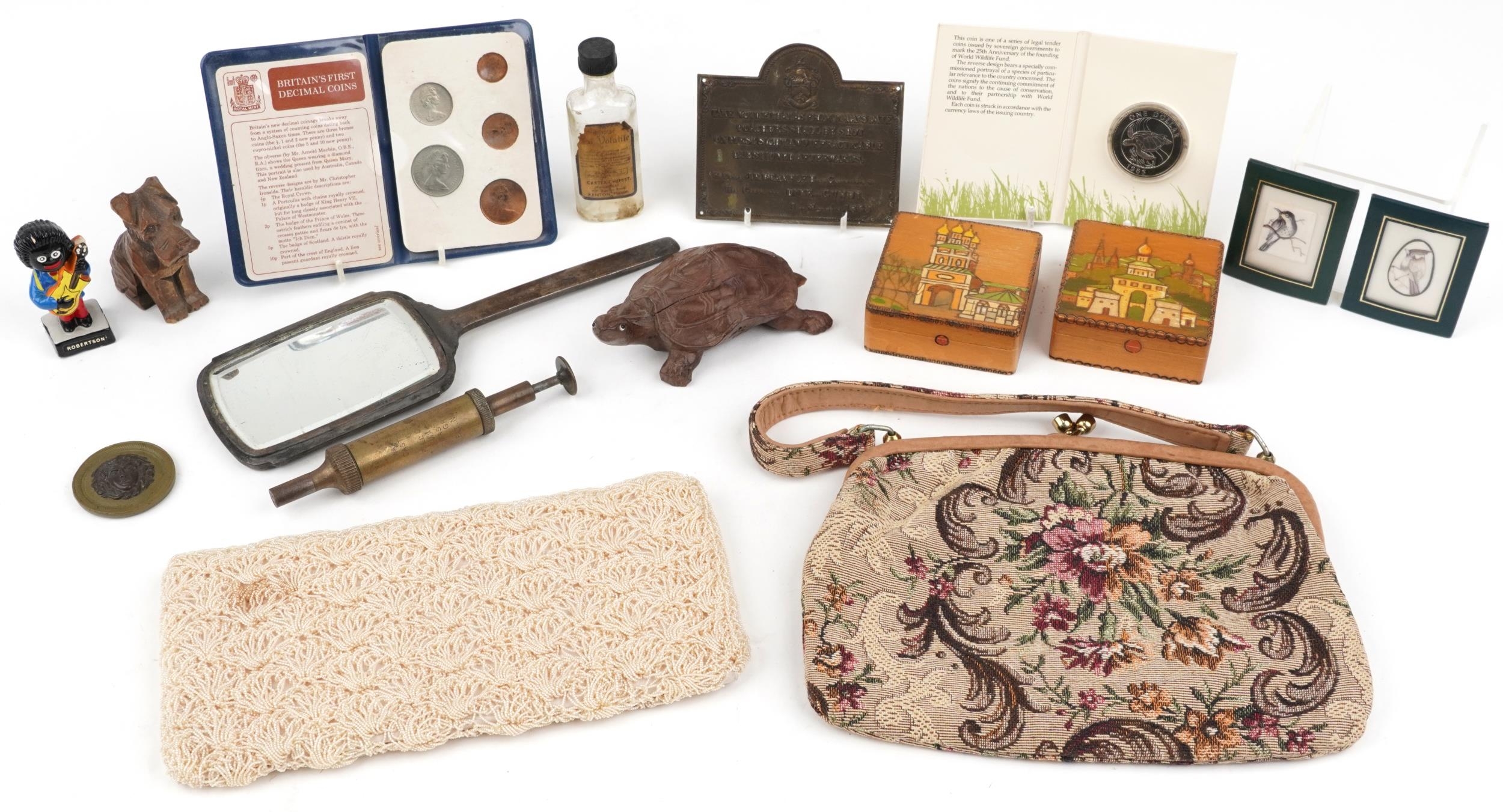 Sundry items including a Medusa roundel, silver hand mirror and a brass plaque relating to poaching