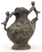 19th century classical patinated bronze jug surmounted and decorated in relief with children and