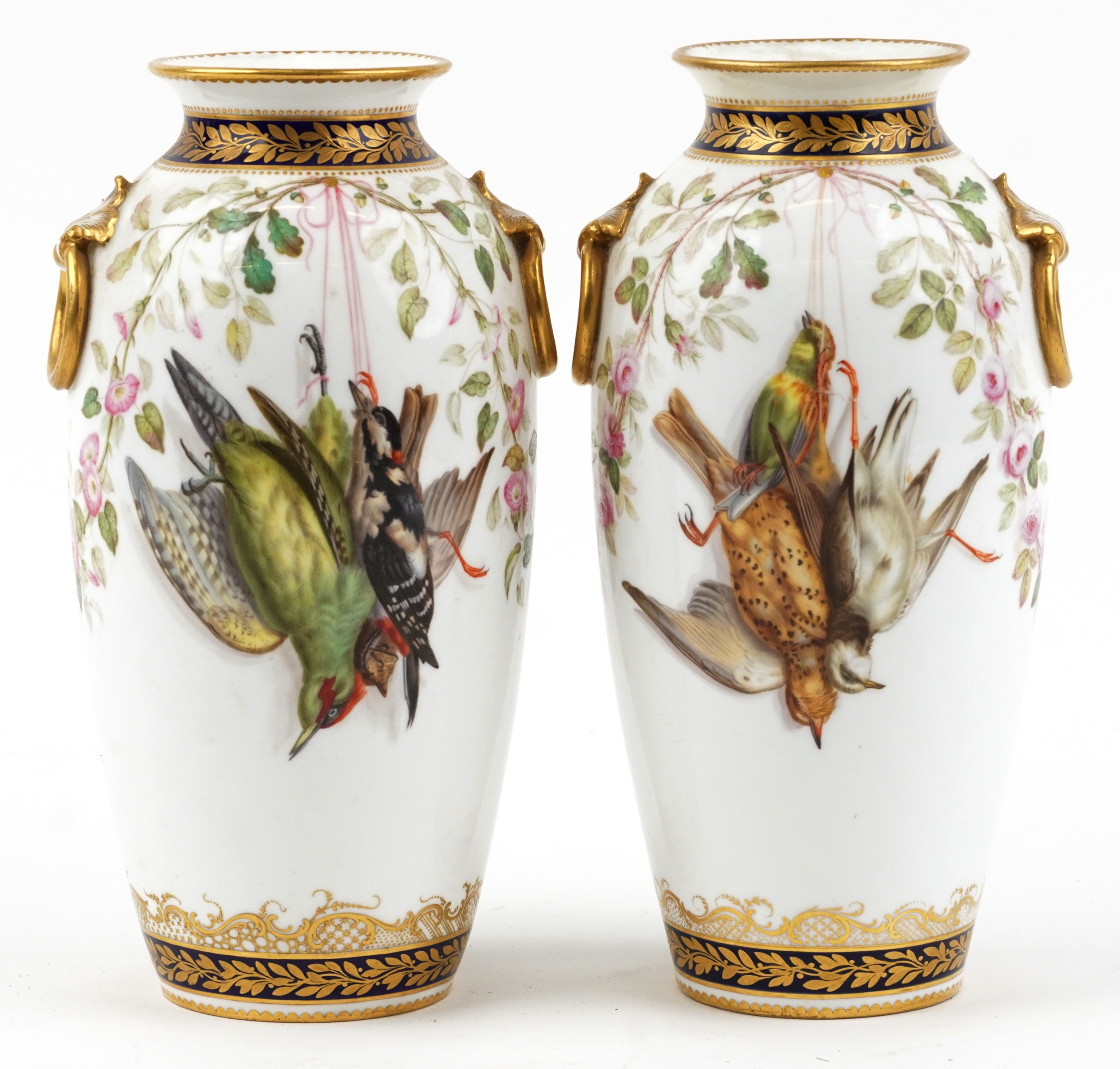 Pair of 19th century European porcelain vases with ring turned handles hand painted with hanging - Image 2 of 4