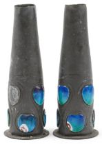 Archibald Knox for Liberty & Co, pair of Arts & Crafts Tudric pewter vases with blue enamelled heart