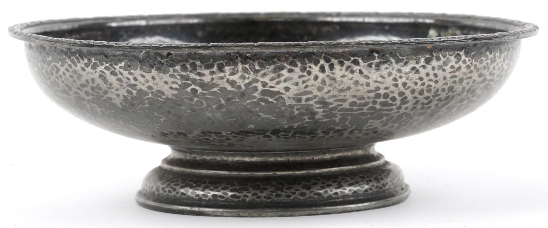 Liberty & Co, Arts & Crafts Tudric pewter footed bowl with planished decoration, 27cm in diameter
