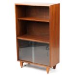 Mid century teak side cabinet with open shelf above two sliding glass doors, 101cm H x 61cm W x 27cm