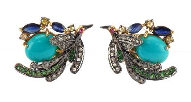Pair of silver gilt bird of paradise stud earrings set with diamonds, emeralds, sapphires and