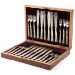 Victorian twelve place canteen of silver plated fish knives and forks engraved and embossed with