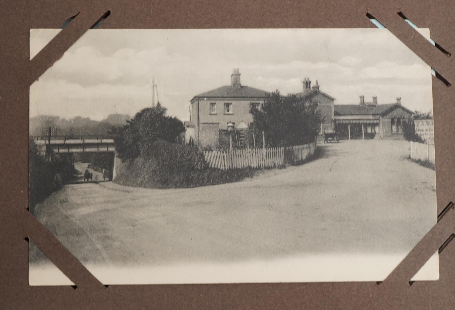 Local interest and railwayana postcards arranged in an album including Eastbourne Railway Station - Image 3 of 13