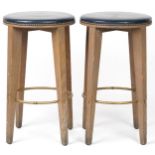 Pair of contemporary breakfast bar stools with blue leather upholstered padded seats, each 72cm high