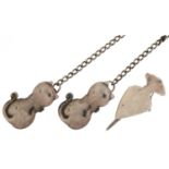 Silver buttonhole napkin clip napkin and one other napkin clip chain in the form of cats, the
