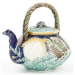 Victorian Majolica teapot decorated in relief with shells and fish, 23cm in length