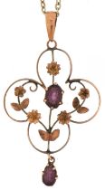 Edwardian 9ct gold purple stone openwork pendant on a yellow metal necklace, 4.5cm high and 36cm