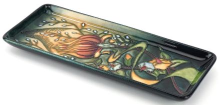 Moorcroft pottery rectangular dish hand painted and tubelined with stylised flowers, dated 2001,