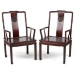 Pair of Chinese hardwood throne chairs, each 96cm high