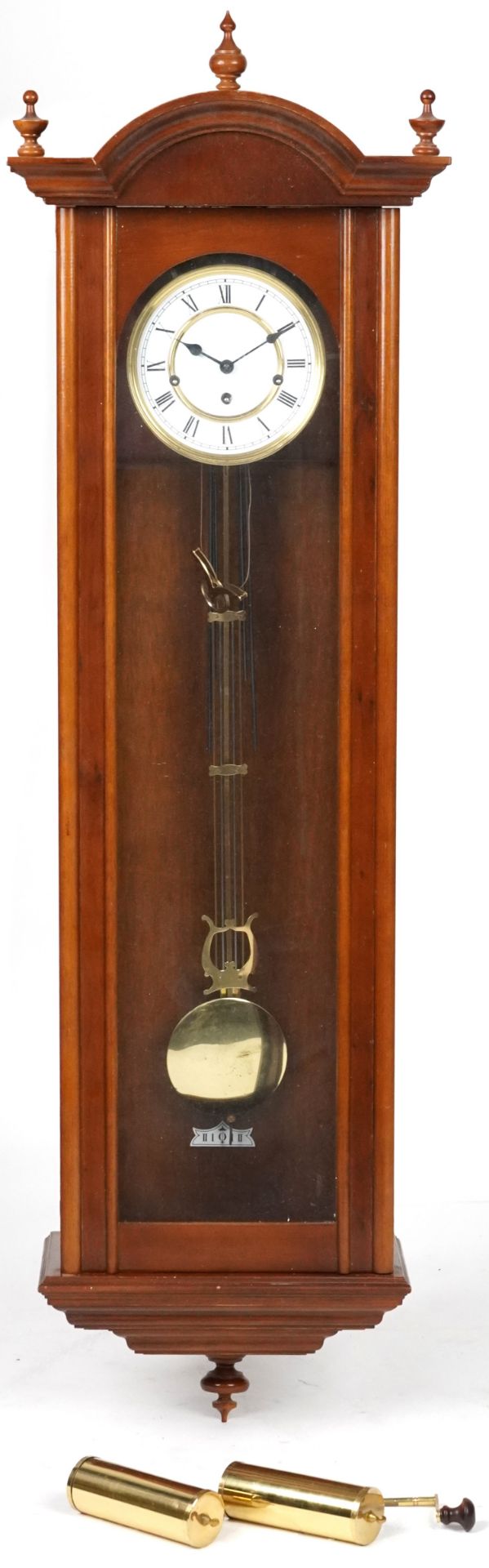 Walnut regulator wall clock striking on eight rods having a circular dial with Roman numerals, 126cm