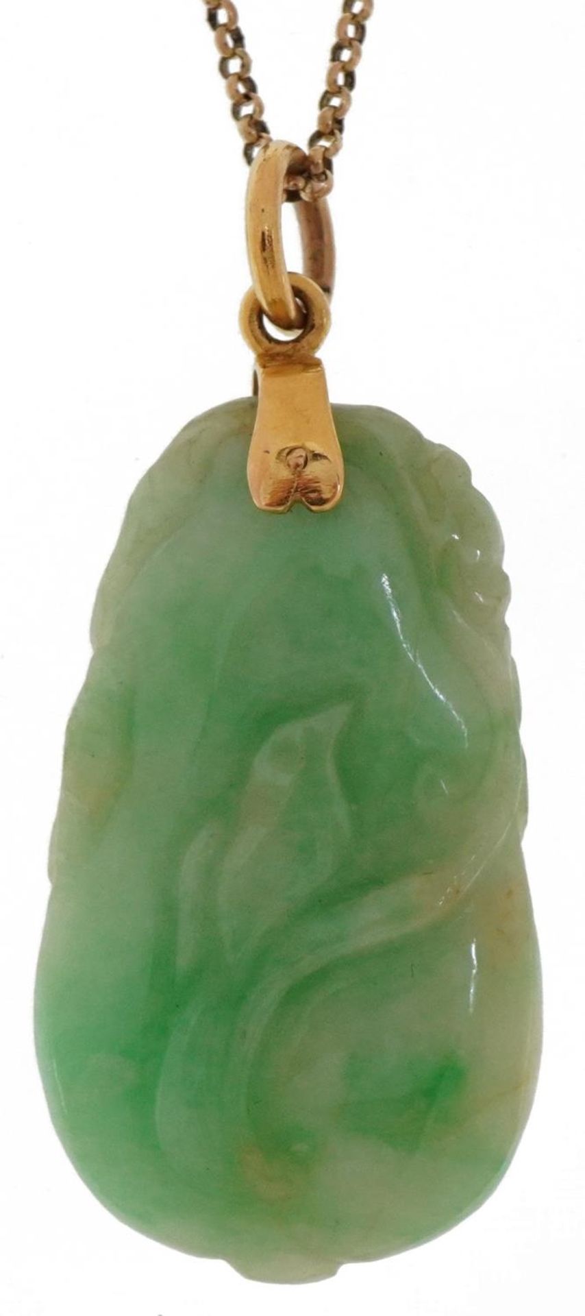 Chinese carved green jade pendant in the form of fruit with unmarked gold mount on a 9ct gold