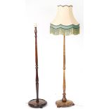 Two early 20th century turned standard lamps, one with silk lined shade, each 160cm high