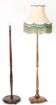 Two early 20th century turned standard lamps, one with silk lined shade, each 160cm high