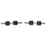 Set of four Art Deco sterling silver gilt and black onyx gentlemen's studs, each 2.5cm in length,