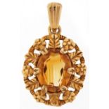 9ct gold citrine pendant with naturalistic setting, 2.5cm high, 2.7g