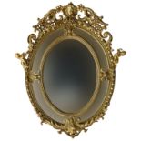Unusually large and impressive 19th century style gilt painted oval wall mirror with bevelled