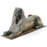 Bronze model of a sphinx, 26cm in length