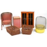 Occasional furniture including a Lloyd loom tub chair, yew wood CD rack and two wicker baskets,