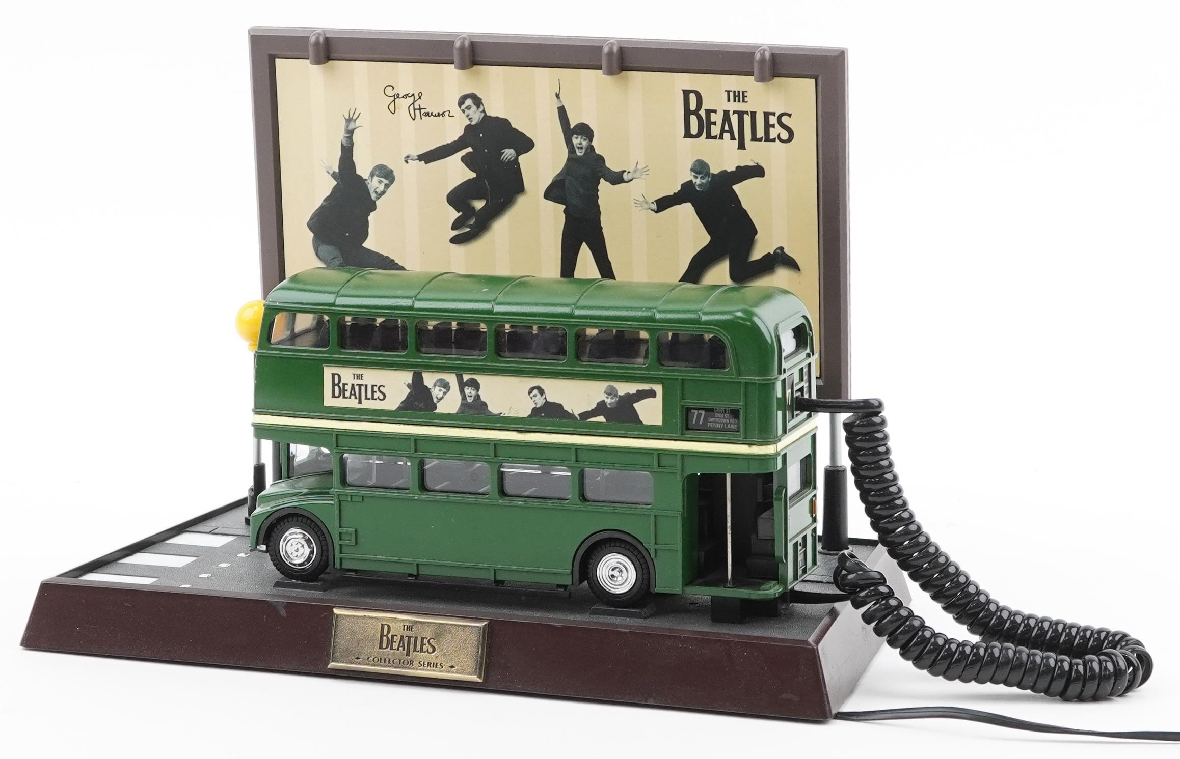 Vintage The Beatles Collector's series Routemaster bus telephone, 31cm wide