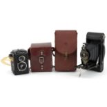 Two vintage cameras with cases a Voigtlander Brilliant and Kodak No 2-A folding Brownie