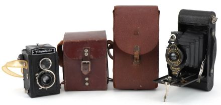 Two vintage cameras with cases a Voigtlander Brilliant and Kodak No 2-A folding Brownie