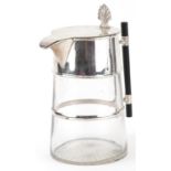 Modernist cut glass water jug with silver plated mounts and ebonised handle, 25cm high