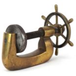 Vintage brass nutcracker in the form of a ship's wheel, 12cm in length