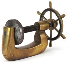 Vintage brass nutcracker in the form of a ship's wheel, 12cm in length