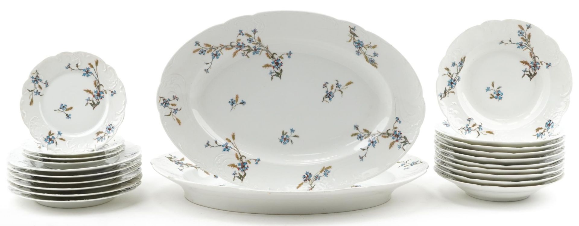 Limoges, French dinnerware including soup bowls and two oval meat platters, each decorated with