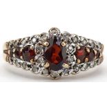 Antique style 9ct gold garnet and diamond cluster ring, size N, 2.6g