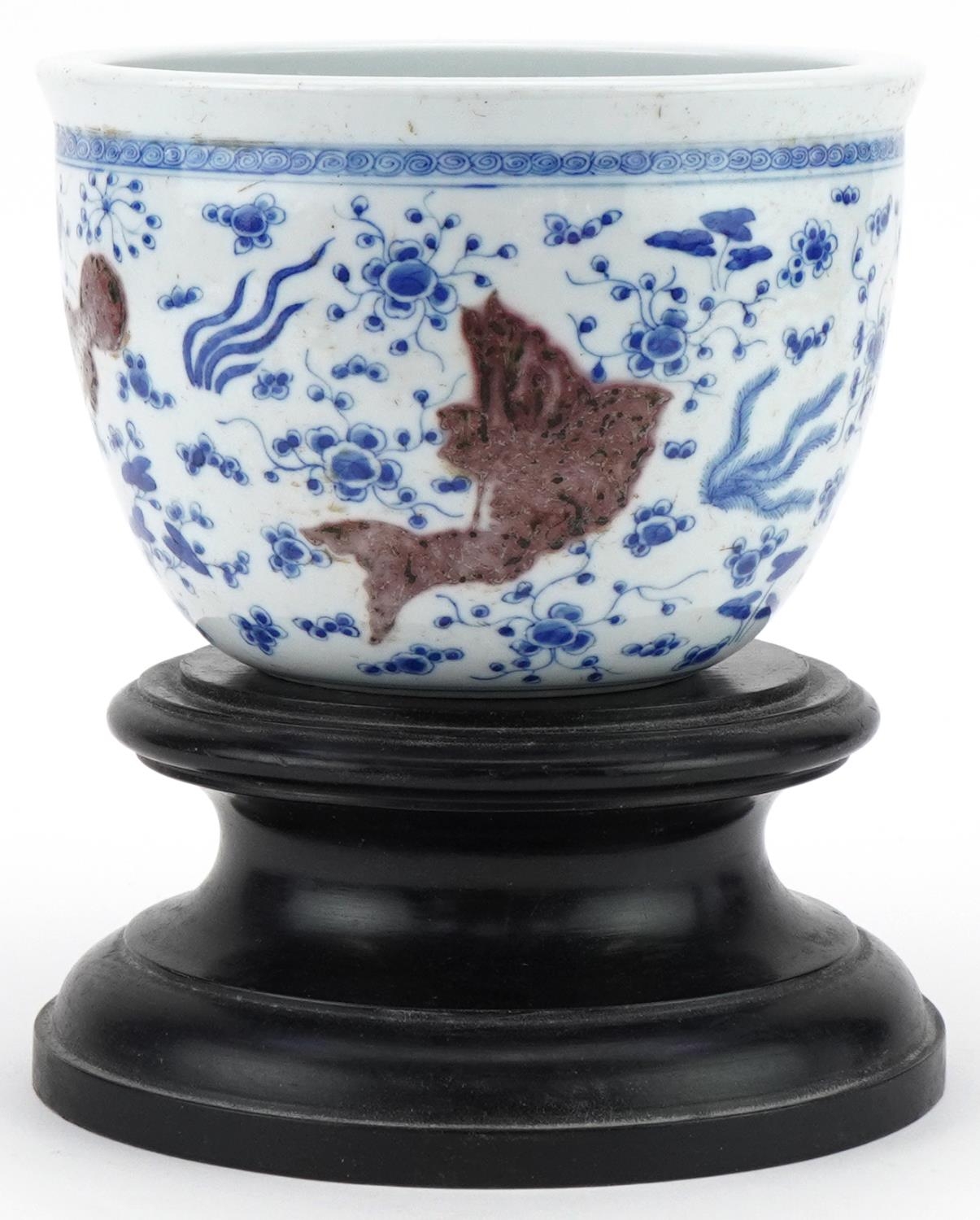 Chinese porcelain jardinière decorated with fish, mounted on a wooden stand, character mark to the - Image 4 of 7