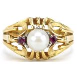 An 18ct gold cultured pearl and ruby ring engraved Handarbeit, size N, 5.1g