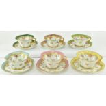 SIX DRESDEN HAND PAINTED CHINA RIBBON EDGE CUPS AND SAUCERS