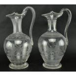 PAIR OF VICTORIAN CIRCA 1860 ENGRAVED GLASS EWERS