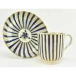 CIRCA 1790 CAUGHLEY PORCELAIN TEACUP AND SAUCER IN COBALT & GILT