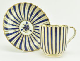 CIRCA 1790 CAUGHLEY PORCELAIN TEACUP AND SAUCER IN COBALT & GILT