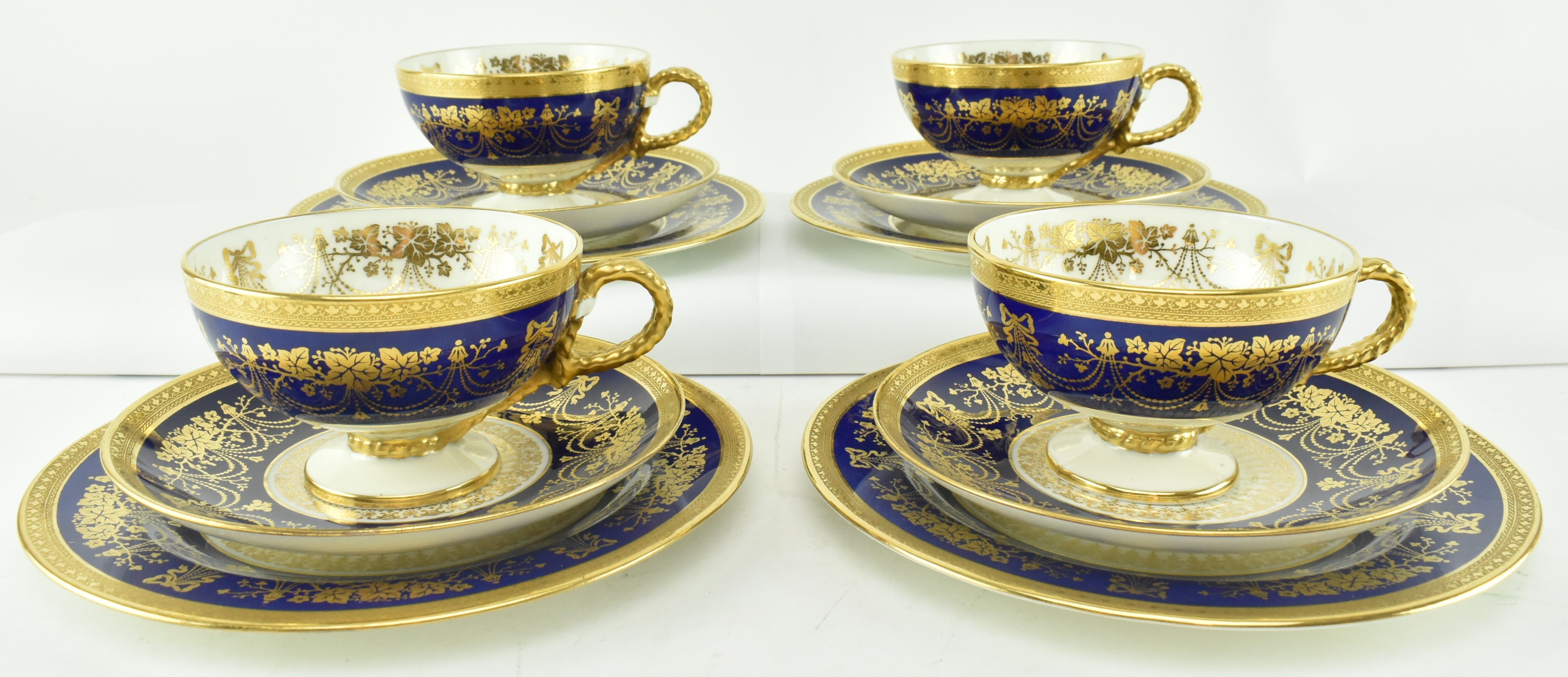 BROWN WESTHEAD & MOORE SET OF TEACUPS & SAUCERS