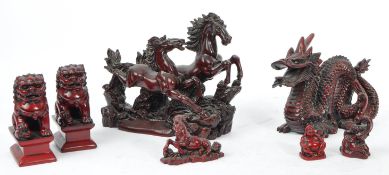 CINNABAR RED DRAGON LUCKY HORSES AND A PAIR OF TEMPLE DOGS