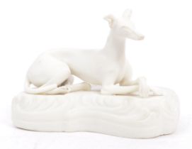 VICTORIAN 19TH CENTURY PARIANWARE PORCELAIN DOG FIGURE