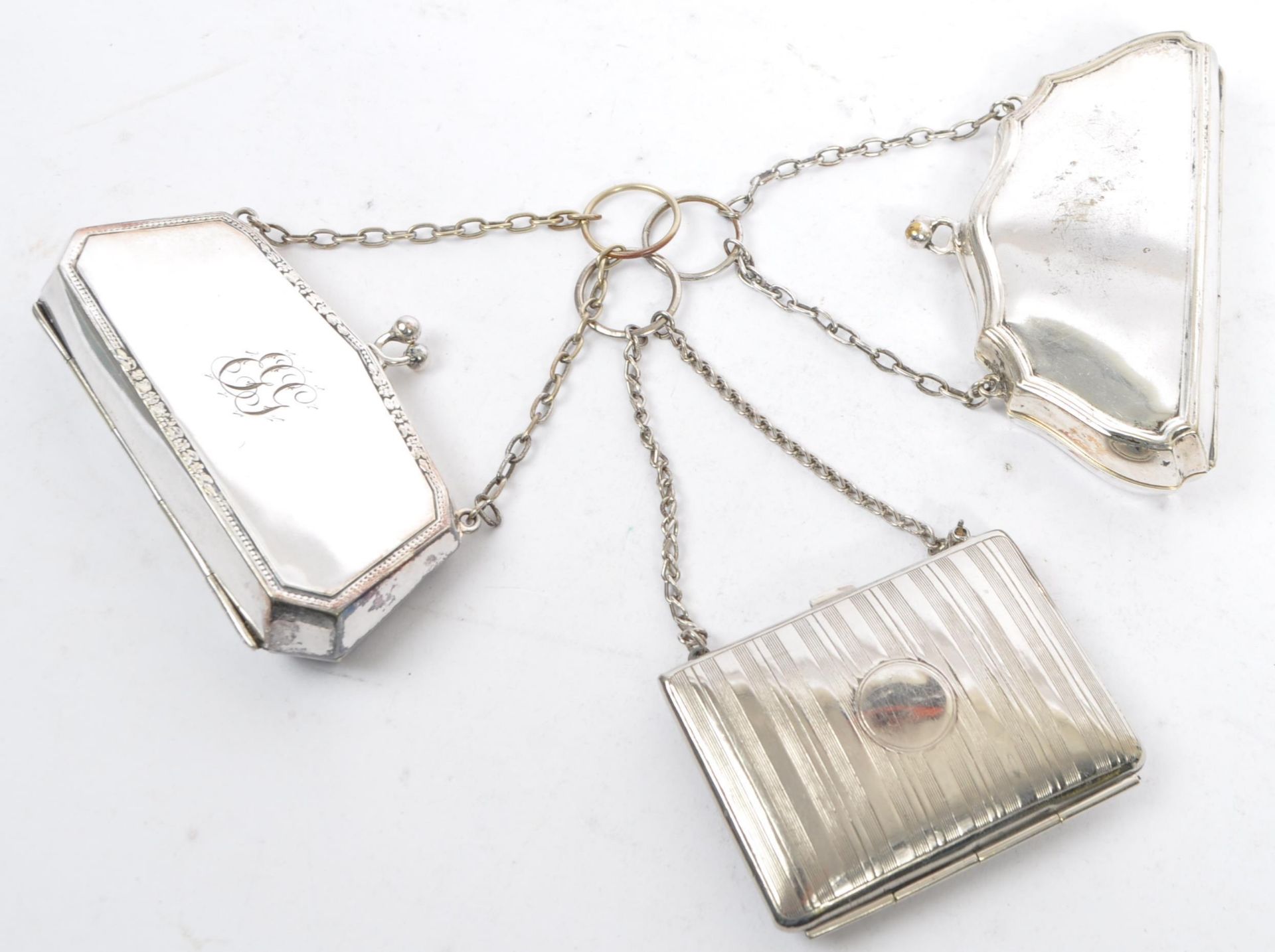 THREE VINTAGE SILVER PLATED COIN PURSES