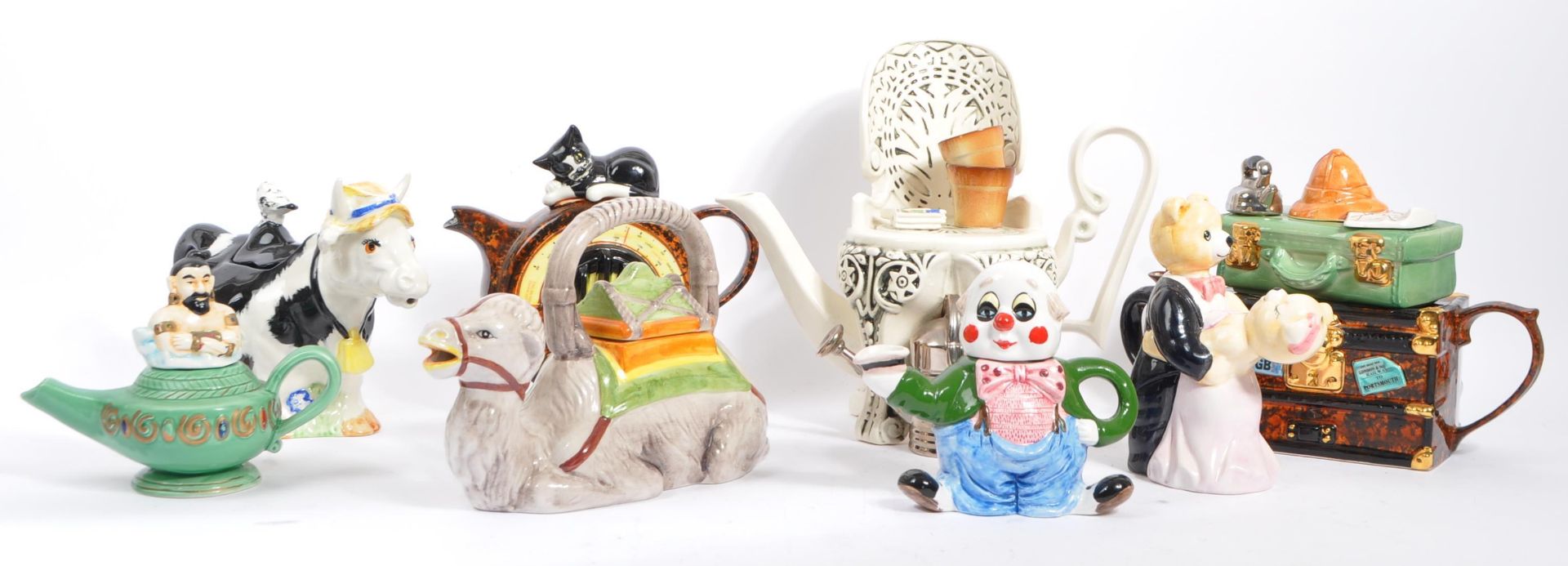 COLLECTION OF LATER 20TH CENTURTY CERAMIC SWINESIDE NOVELTY TEAPOTS