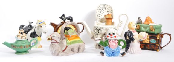 COLLECTION OF LATER 20TH CENTURTY CERAMIC SWINESIDE NOVELTY TEAPOTS