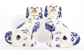 PAIR OF 19TH CENTURY STAFFORDSHIRE BLUE & WHITE DOGS