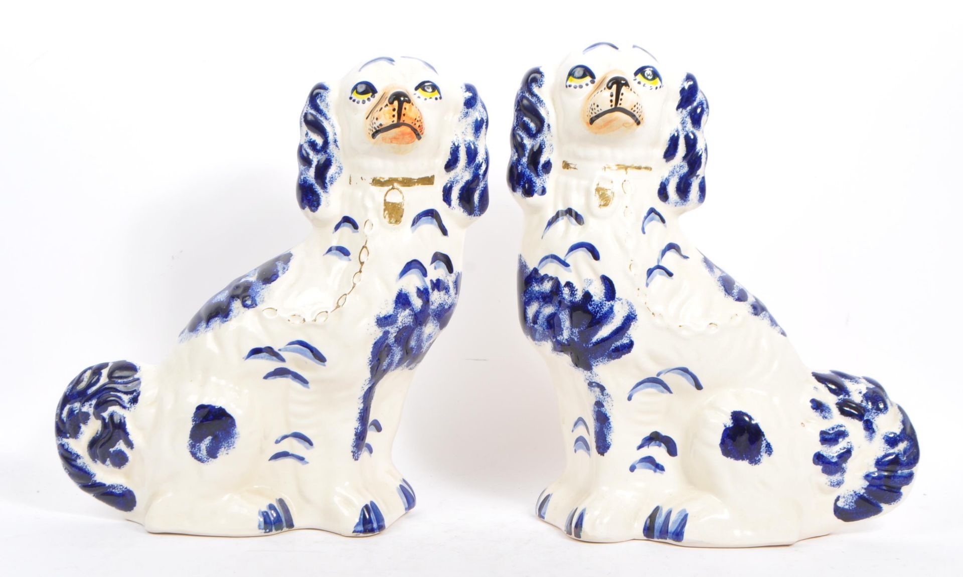 PAIR OF 19TH CENTURY STAFFORDSHIRE BLUE & WHITE DOGS