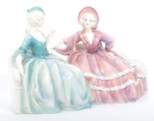 TWO LADIES SITTING ON COUCH KATZHUTTE FIGURE