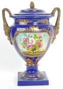 EARLY 20TH CENTURY PORCELAIN LIDDED URN