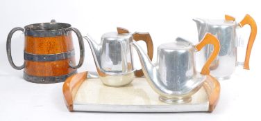 MID CENTURY PIQUOT WARE TEA/COFFEE SET & THREE HANDLED CUP