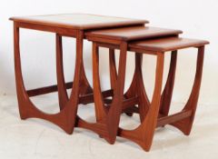 A 1970S G-PLAN FURNITURE ASTRO TEAK WOOD NEST OF TABLES